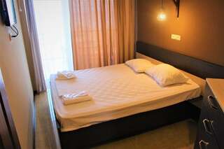 Отель Lux Apartment in The Mgzavrebi Hotel Гонио Апартаменты с 2 спальнями-10
